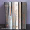 Gray and black books on diplay for mens home decor. 
