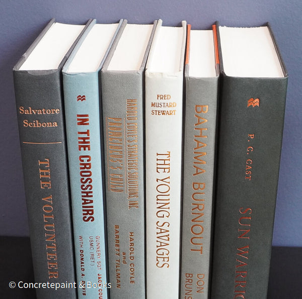 Gray and black books on diplay for mens home decor. 
