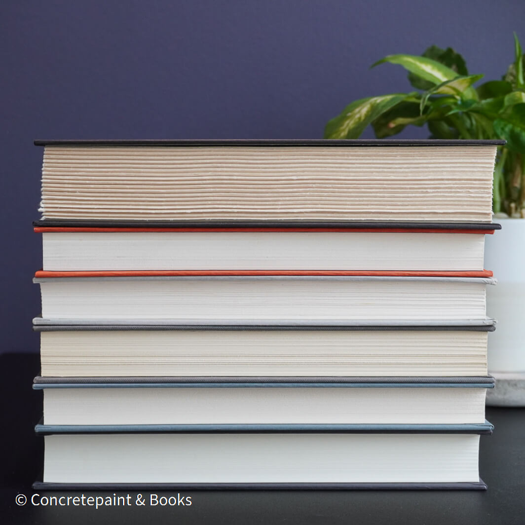 Gray and black books on diplay for mens home decor. 