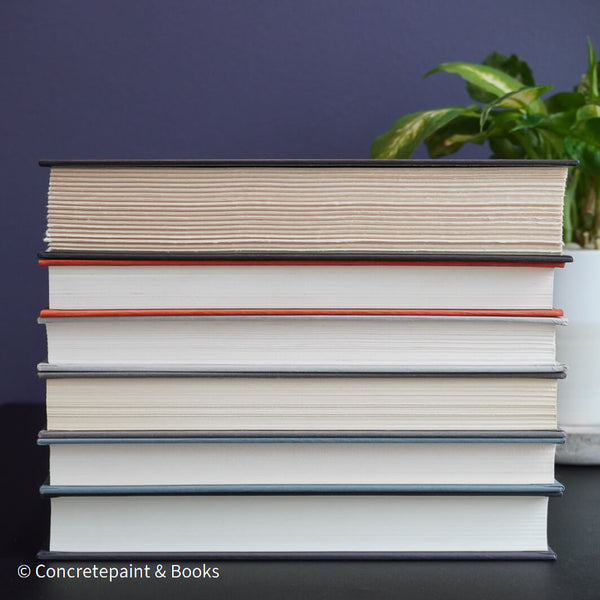 Gray and black books on diplay for mens home decor. 
