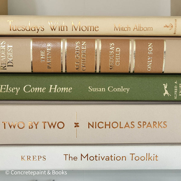 Olive green and neutral books used as shelf decor. Set of books for reading and decorating.