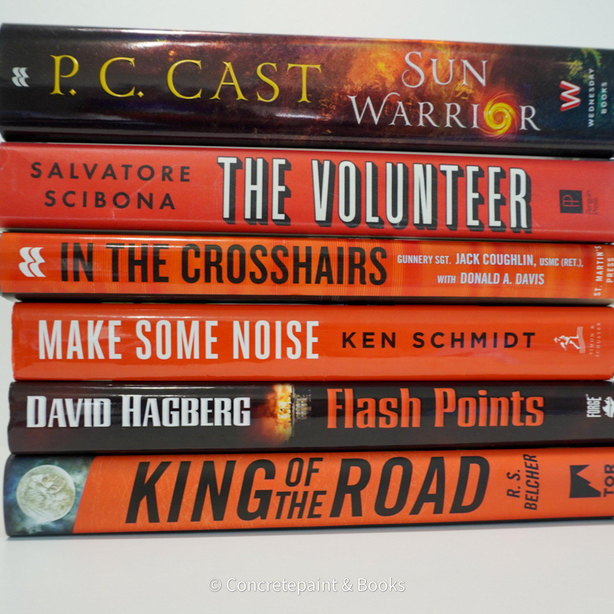 Stack of black and gray hardcover books with copper font. Real books staged and used as shelf décor.