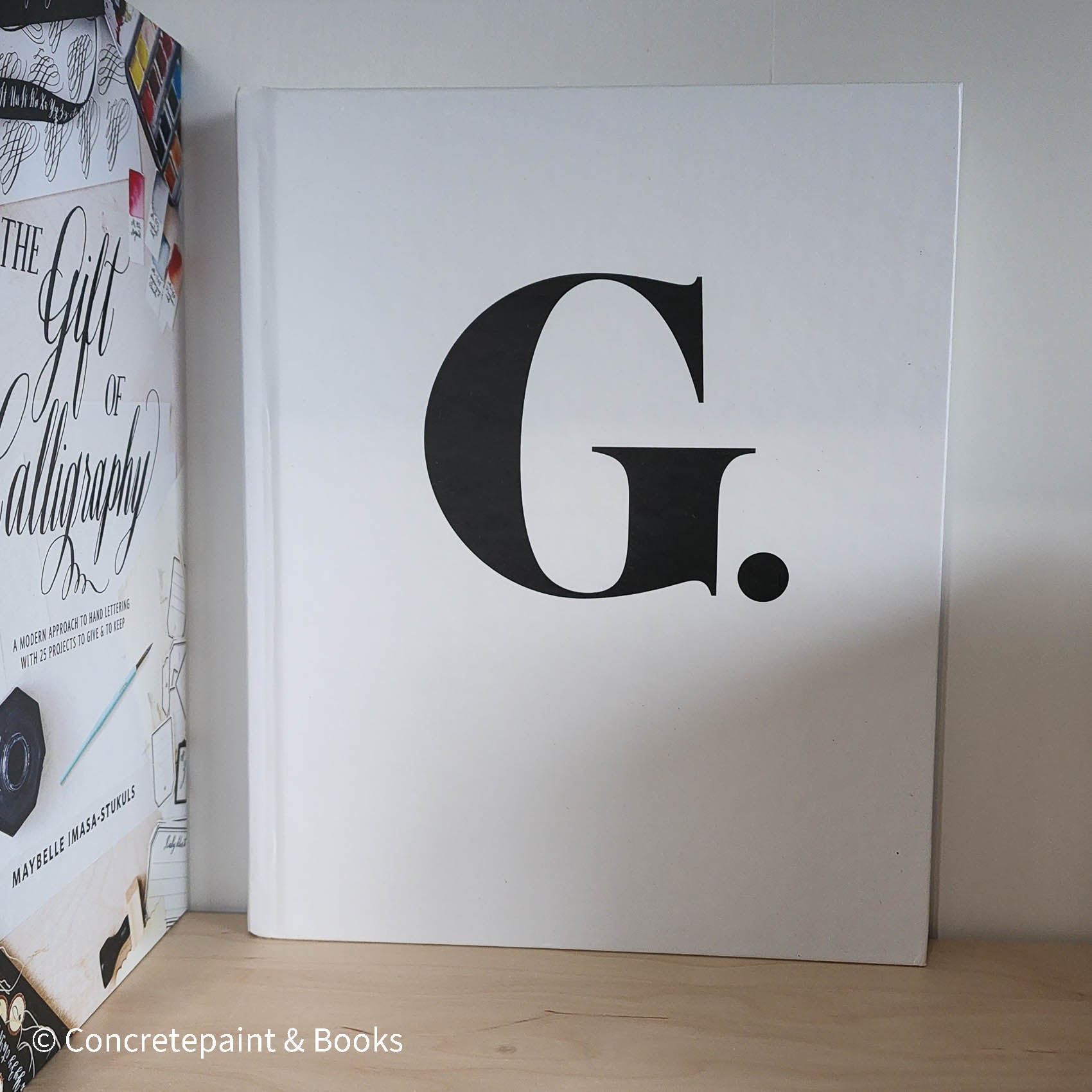 White coffee table book used for home decor. 