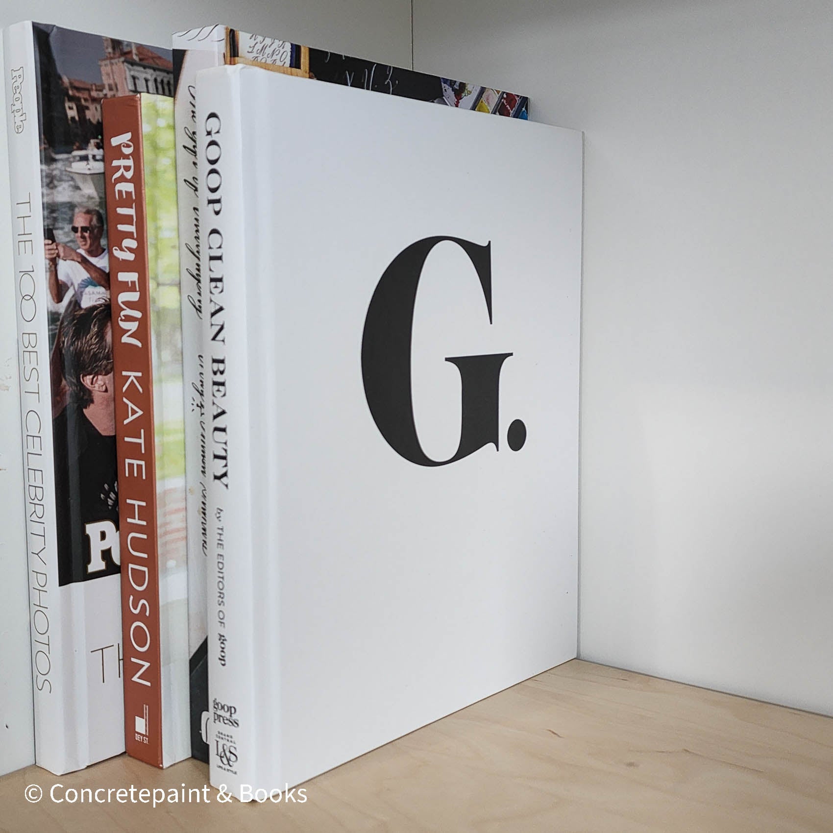 White coffee table book used for home decor.