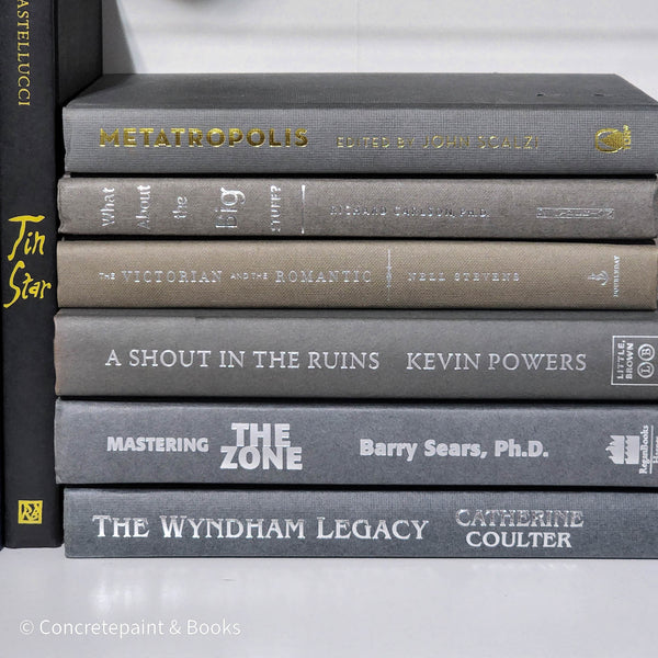 Set of used books with gray binding for home display and decoration.