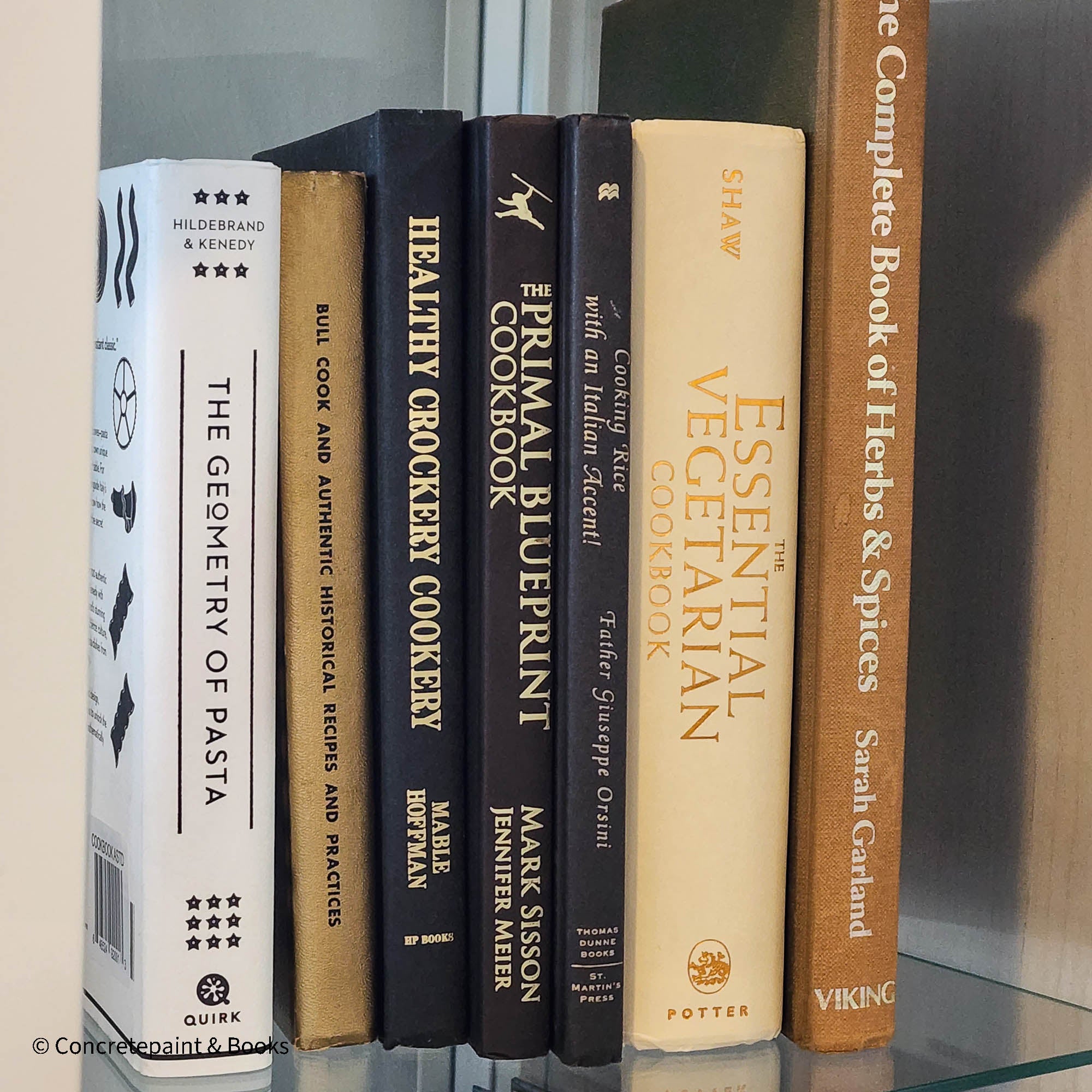 neutral, black, white and gold kitchen decoration. Cookbooks used as kitchen decoration  