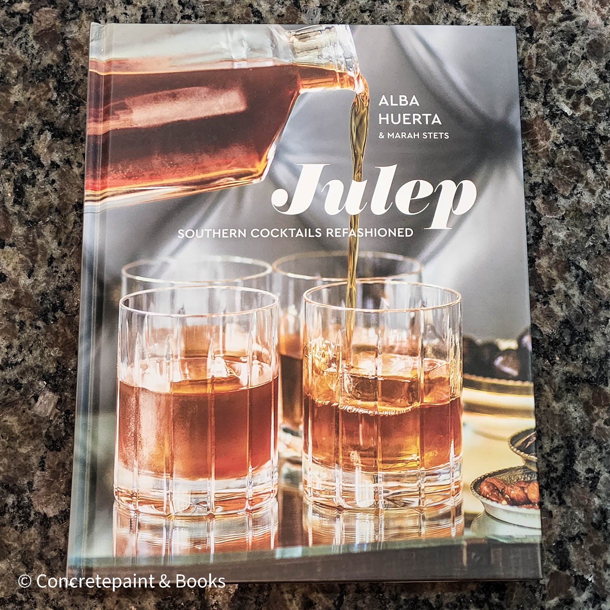 Diet and cookbooks for decoration and reading. Neutral, blue and gray kitchen or coffee table decoration.