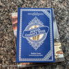 Diet and cookbooks for decoration and reading. Neutral, blue and gray kitchen or coffee table decoration.