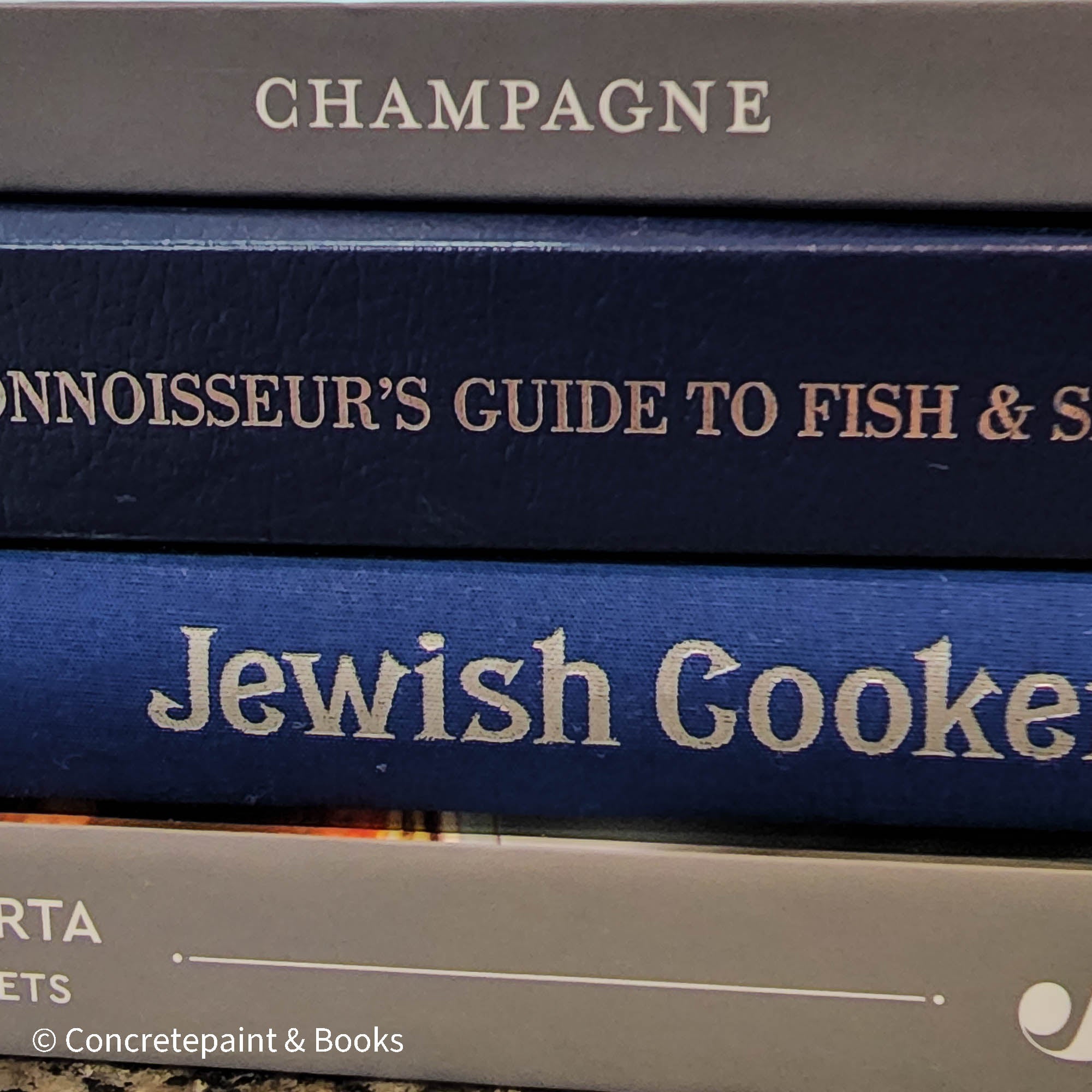Diet and cookbooks for decoration and reading. Neutral, blue and gray kitchen or coffee table decoration.