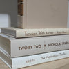 Olive green and neutral books used as shelf decor. Set of books for reading and decorating.