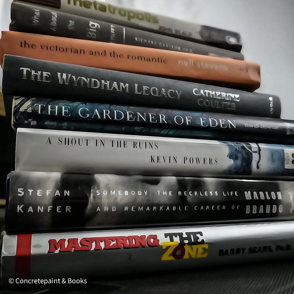 Set of used books with gray binding for home display and decoration.
