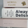 stack of cookbooks for decorating kitchen. White and blush kitchen decor. 