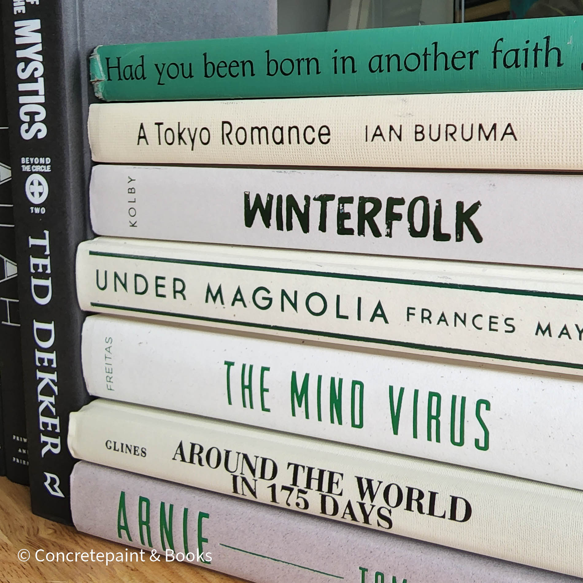 Green neutral and gray real hardcover book stack used for decoration.