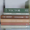 Green and brown books used for shelf decor. 