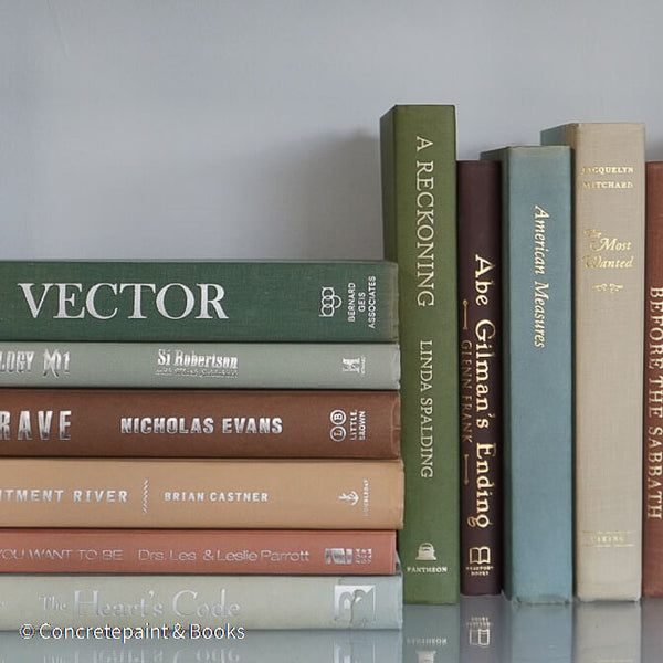 Green and brown books used for shelf decor. 