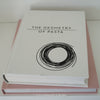 Stack of hardcover books used to decorate. Blush and neutral display books.