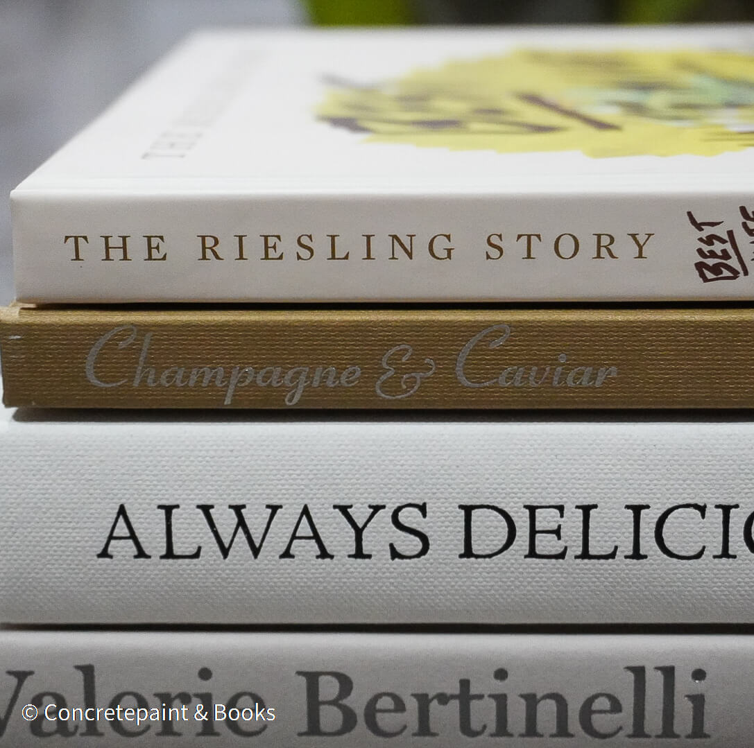 Set of decorative cookbooks for display. Neutral kitchen décor. 