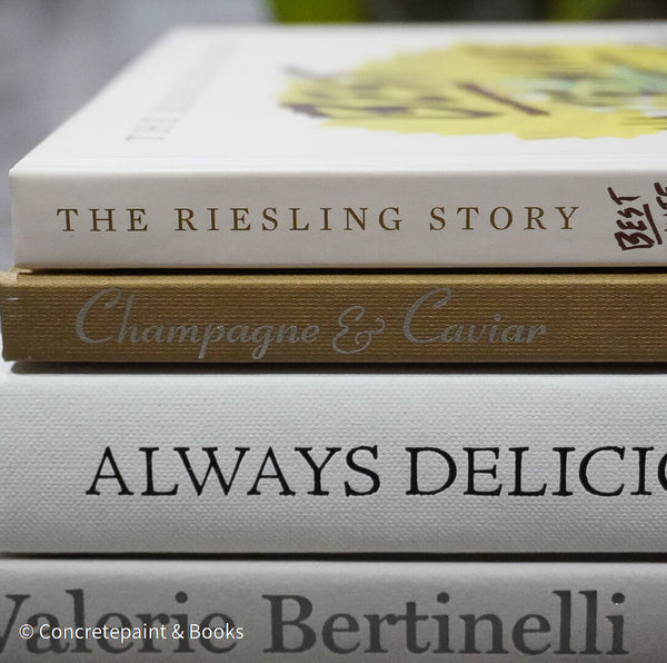 Set of decorative cookbooks for display. Neutral kitchen décor. 