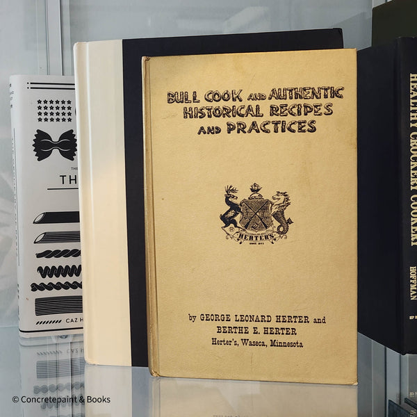 neutral, black, white and gold kitchen decoration. Cookbooks used as kitchen decoration  