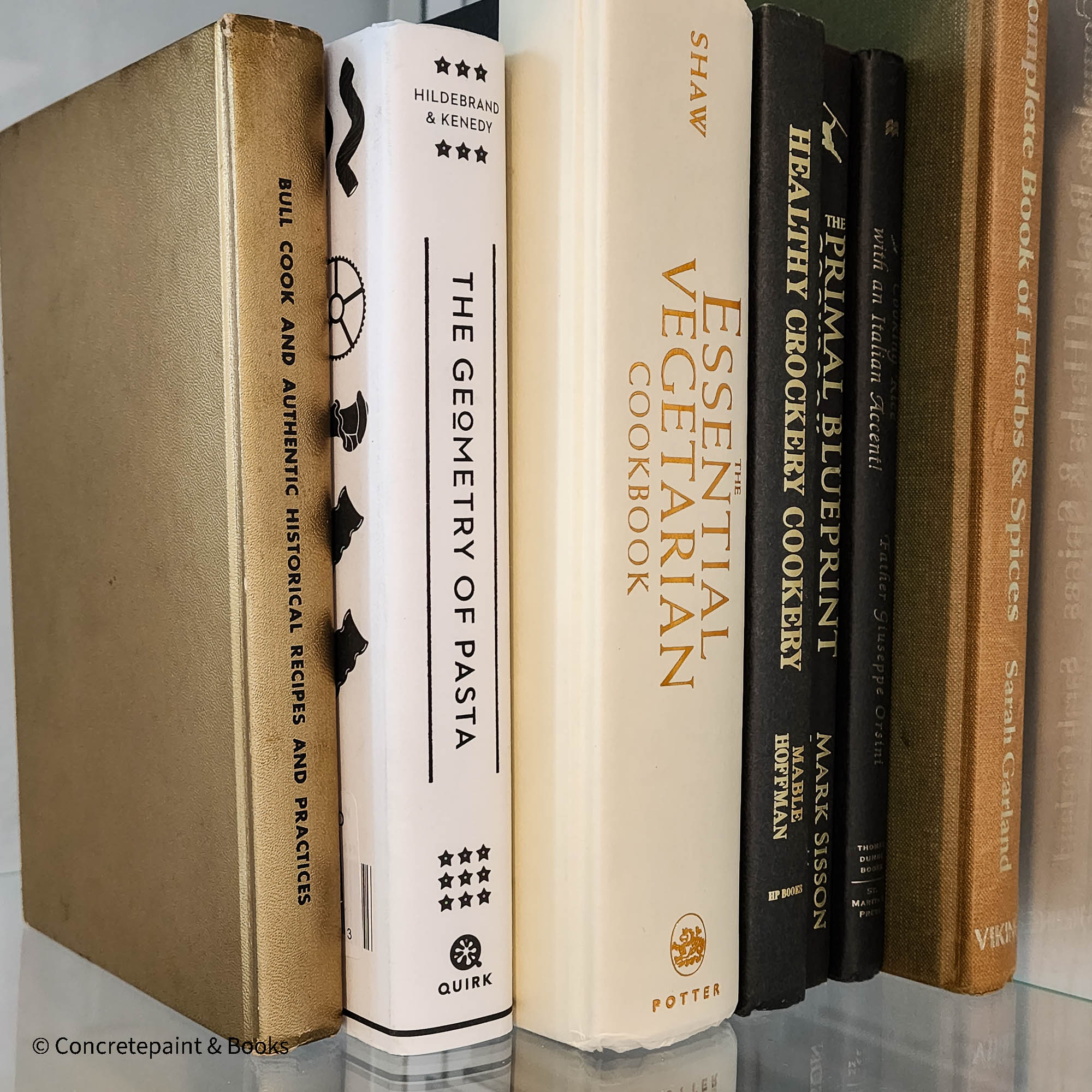 neutral, black, white and gold kitchen decoration. Cookbooks used as kitchen decoration  