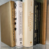 neutral, black, white and gold kitchen decoration. Cookbooks used as kitchen decoration  