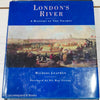 Vintage coffee table book. Navy blue and terra-cotta colored books. Decorative books for display. 