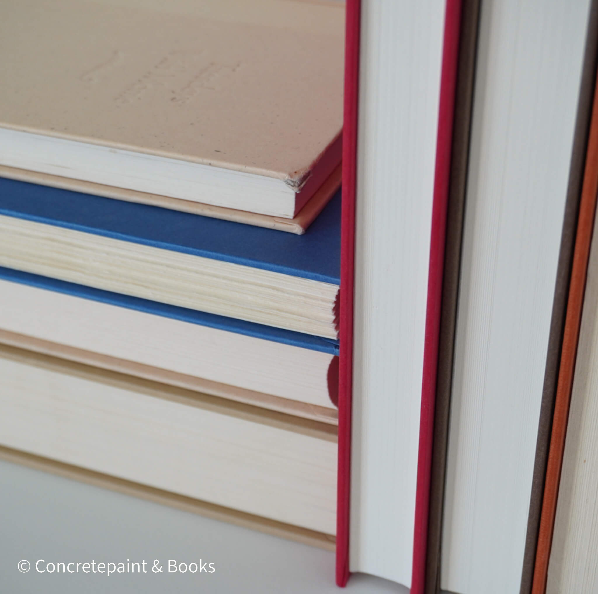 Books for display on shelf. Neutral and warm toned home decor. 