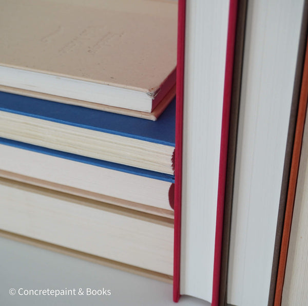 Books for display on shelf. Neutral and warm toned home decor. 