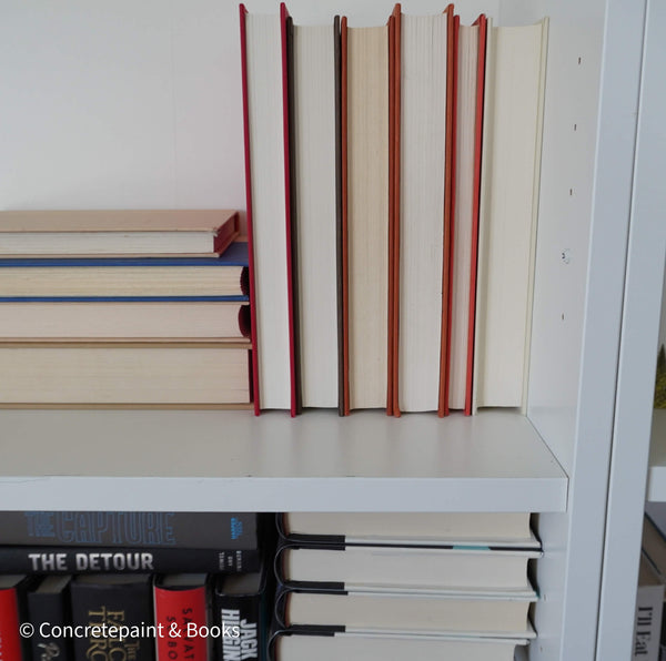 Books for display on shelf. Neutral and warm toned home decor. 