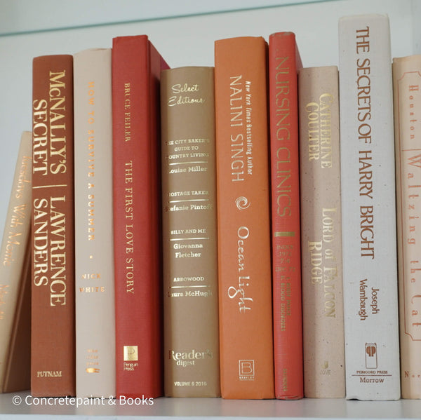 Books for display on shelf. Neutral and warm toned home decor. 