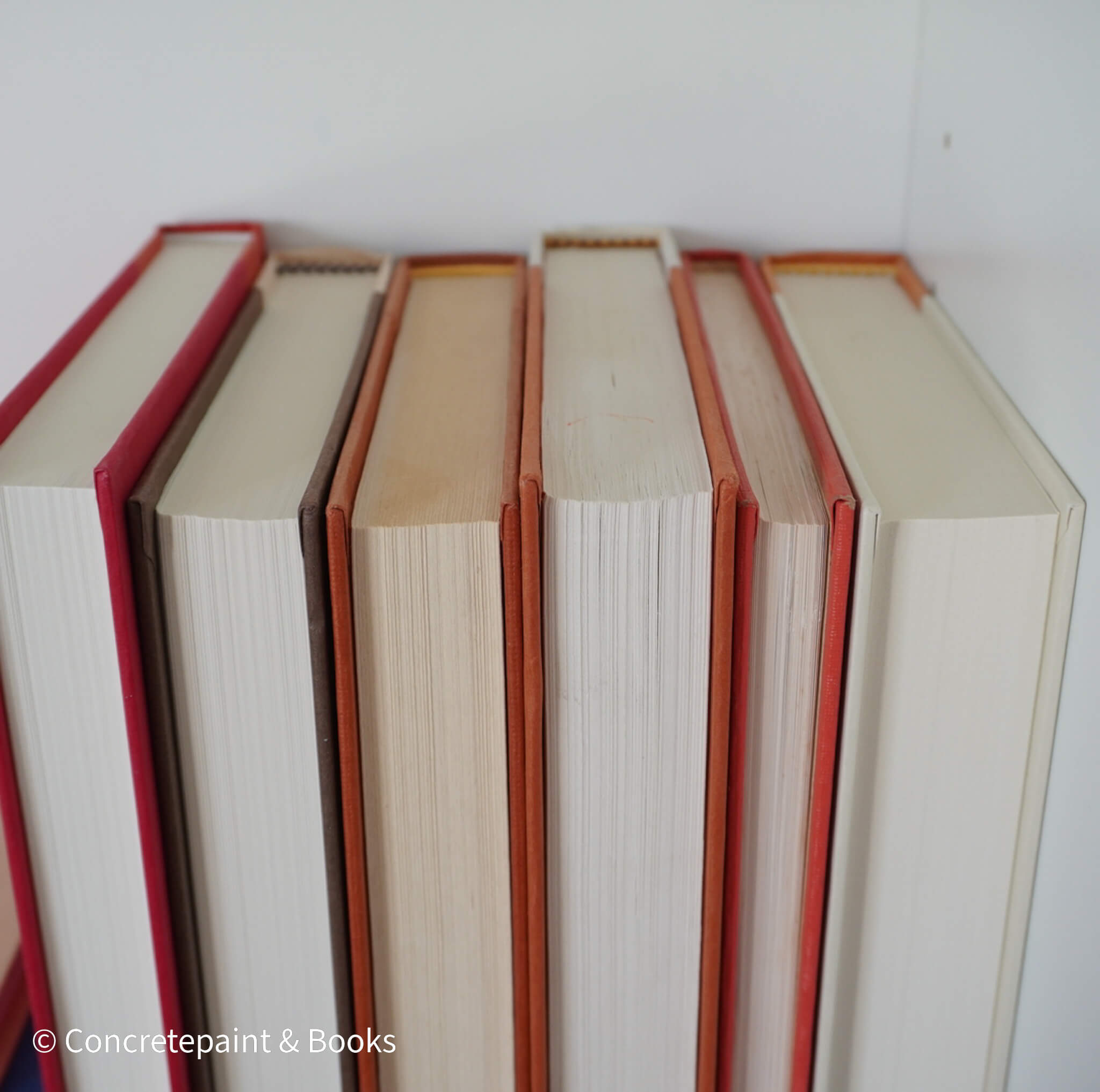 Books for display on shelf. Neutral and warm toned home decor. 