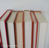 Books for display on shelf. Neutral and warm toned home decor. 