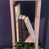 Real black and neutral headcover books used as staged home décor. Novels and large coffee table books black and neutral.