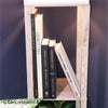 Real black and neutral headcover books used as staged home décor. Large coffee table books black and neutral.