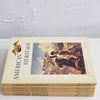 Set of cream hardcover vintage books.