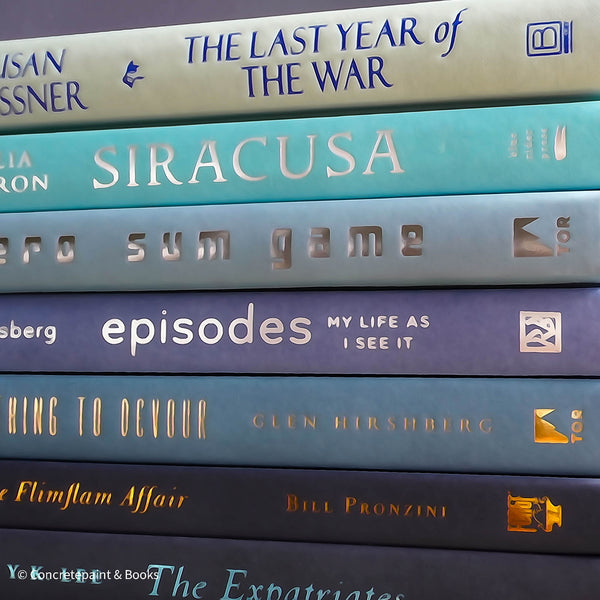Real hardcover books in shades of blue for home decoration.